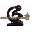 balishine This abstract statue is a handicraft of Bali made from suar wood.