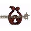 balishine This abstract statue is a handicraft of Bali made from suar wood.