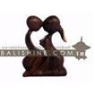 balishine This abstract statue is a handicraft of Bali made from suar wood.