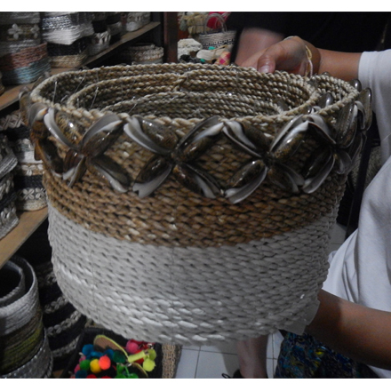Balishine: Your natural source of indonesian handicraft presents in its Home Decor collection the Shell Trimmed Seagrass Basket:12JEN368095:Handwoven natural seagrass baskets?set of 3 pcs with shells around the top of each basket. White base with natural contrast. Perfect for storage or pot plants covers. Other colors possible please contact us.?  Made from seagrass, ecofriendly and biodegradable.