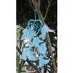balishine This dream catcher is a handicraft of Bali made from string and feather.